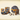 Assorted Venchi chocolate gift boxes, a round tin, chocolate bar, pralines, and a jar of chocolate spread, all decorated in blue and gold packaging with orange ribbons, displayed on a cream background.