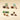 Medium Vintage Dream tin filled with an elegant selection of layered, hazelnut, and cream gourmet chocolates. - AI generated text
