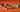 An assortment of chocolates, chocolate bars, and pralines with various layers, fillings, and coatings are arranged on an orange surface against an orange background. - AI generated text
