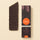 A Chocoviar 75% extra dark chocolate bar, textured with cocoa nibs, beside its elegant black and orange signature wrapper. - AI generated text