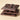 Three elegant 70% Extra Dark 2.46 oz bars, each embossed with VENCHI, artfully stacked against a refined beige backdrop. - AI generated text