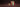 Elegant assortments of chocolate bars, cocoa pods, and boxed chocolates with rich flavors arranged on a warm brown background. - AI generated text