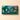 Vintage Dream assorted chocolate gift box in deep green with festive illustrations and a refined tied green bow. - AI generated text